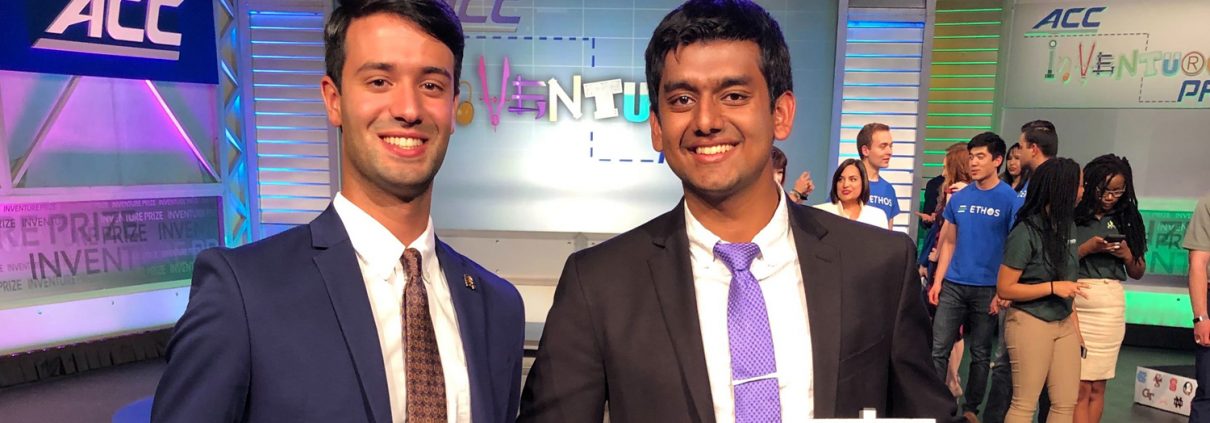 Alexander Singh and Rohit Rustagi hold their ACC InVenture trophies