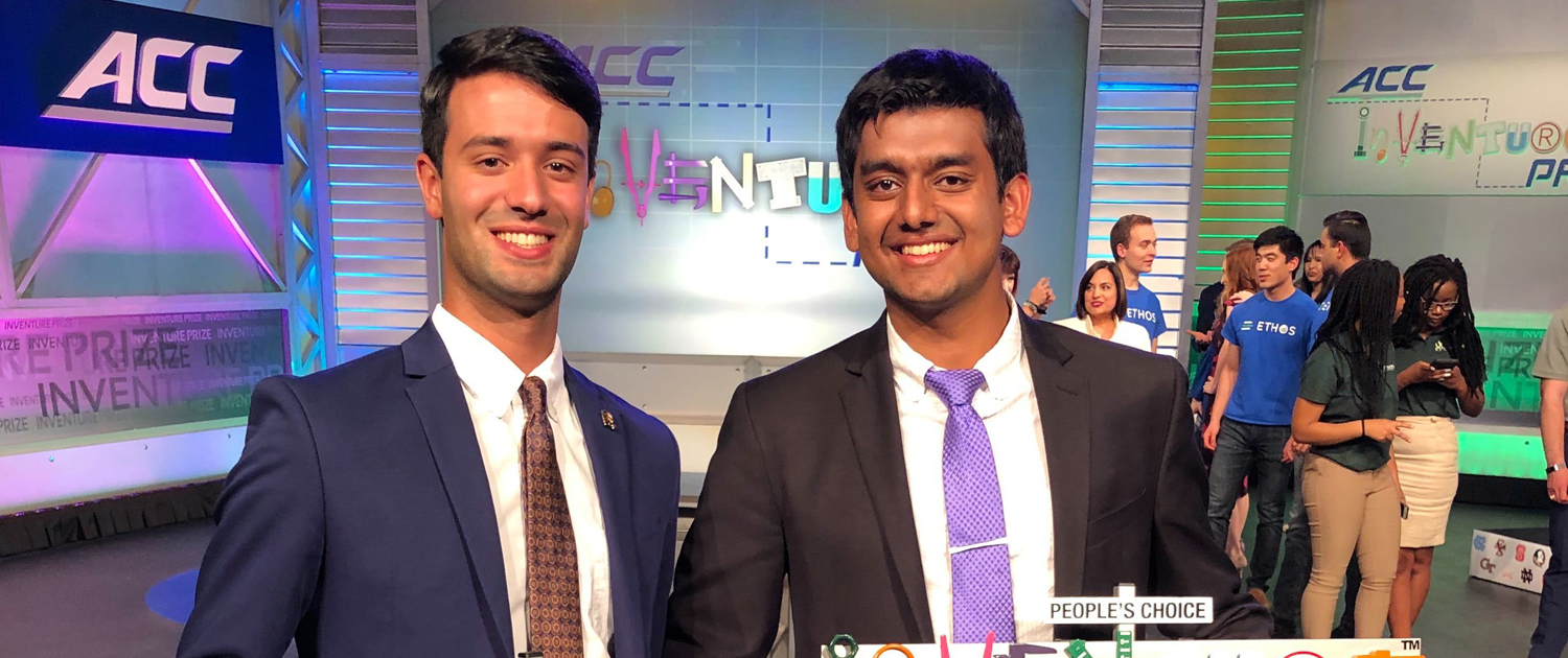 Alexander Singh and Rohit Rustagi hold their ACC InVenture trophies